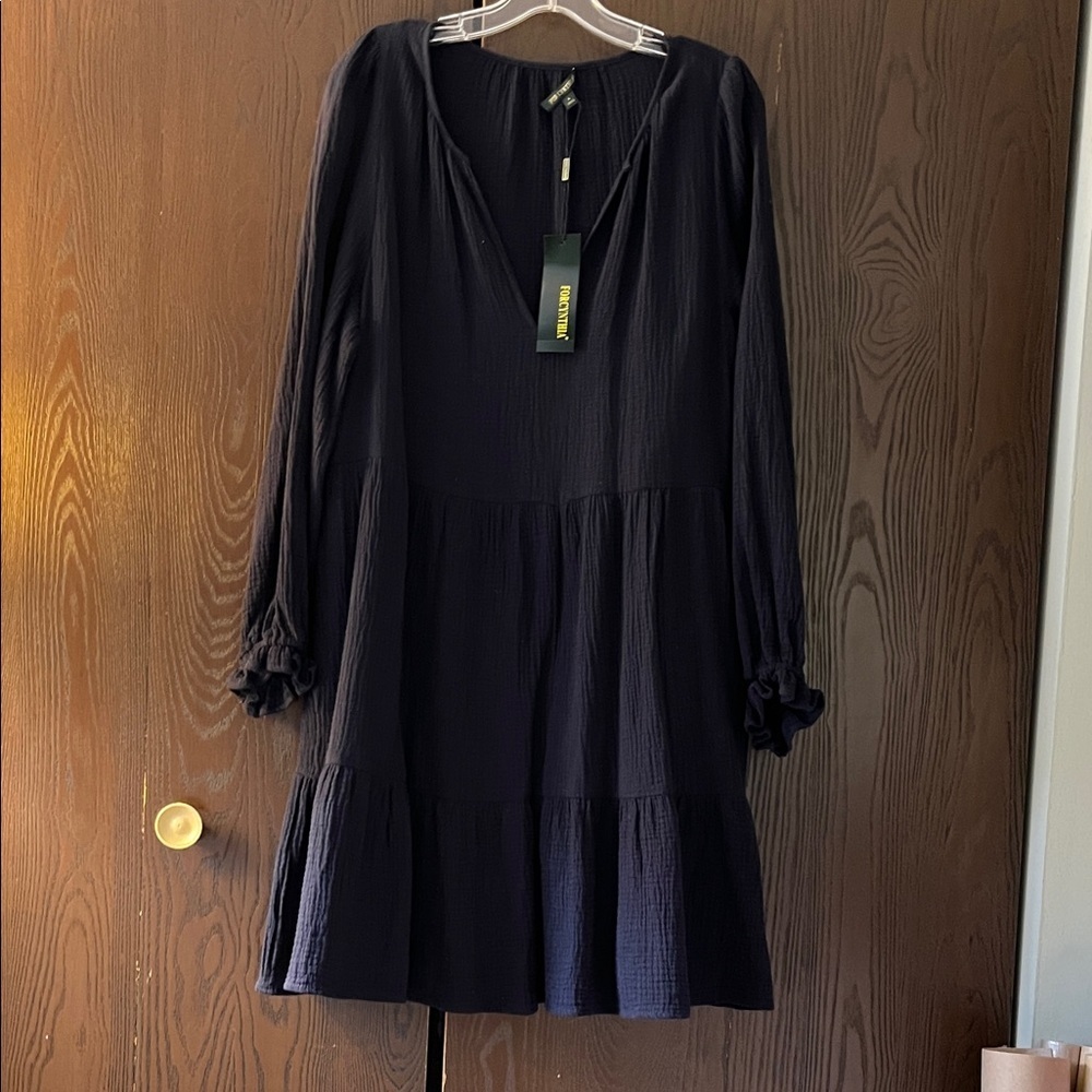 For Cynthia long sleeved, maxi dress. Navy blue. Low V neck. Size Large. NWT